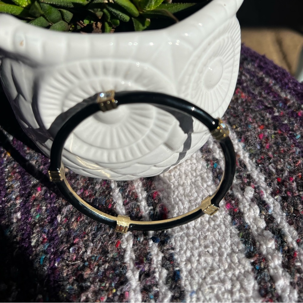 Cute, black and gold bangle bracelet with clear stone embellishments - Picture 2 of 4
